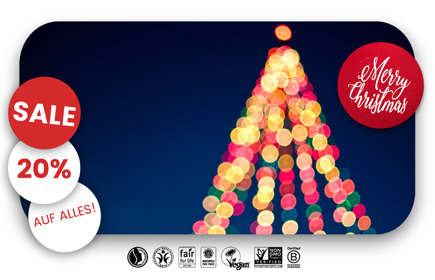 Weihnachtliches biorundum-Banner mit goldener Merry-Christmas-Schrift, festlicher Dekoration aus Tannenzweigen und Lichterglanz; der Schriftzug kündigt einen 20 % Weihnachtsrabatt an und strahlt warme, elegante Festtagsstimmung aus.